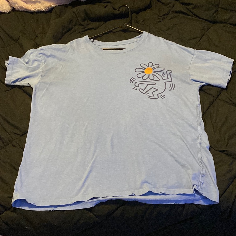 The brand is aerie. The size is a medium. The color is a light/sky blue.